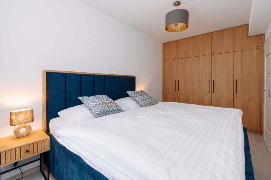 Postel nebo postele na pokoji v ubytování Apartmán 12 - Rezidence K Lanovce