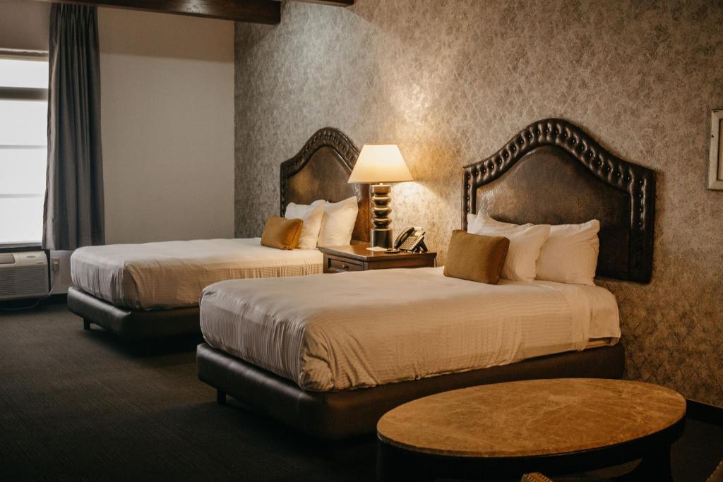 Postel nebo postele na pokoji v ubytování Hotel María Bonita Chihuahua