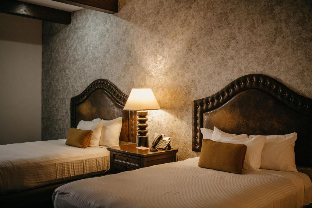 Postel nebo postele na pokoji v ubytování Hotel María Bonita Chihuahua