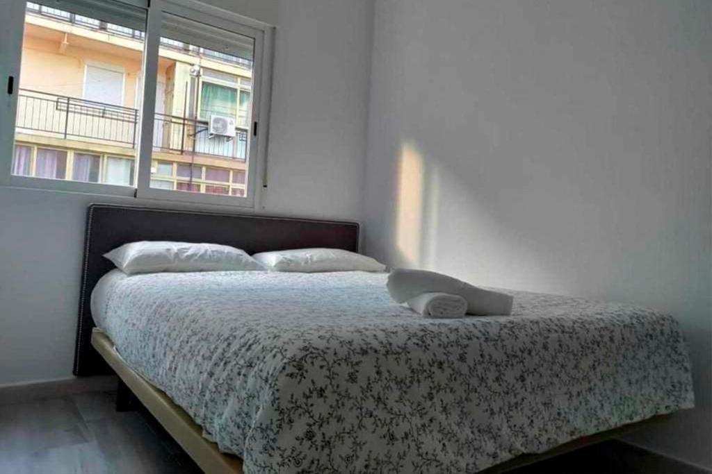 Posteľ alebo postele v izbe v ubytovaní Puerto benidorm center