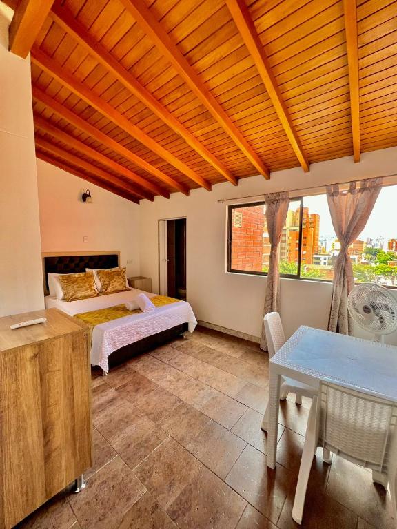 Postel nebo postele na pokoji v ubytování Hotel Torre Primavera
