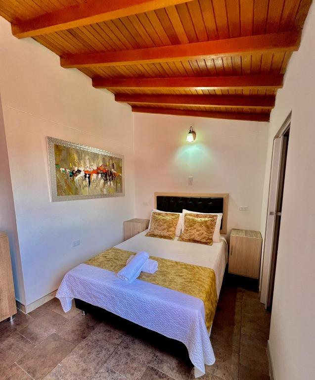 Postel nebo postele na pokoji v ubytování Hotel Torre Primavera