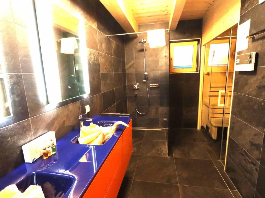 Kúpeľňa v ubytovaní Kaprun Lodge - L