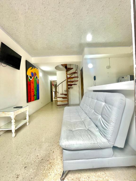 TV a/nebo společenská místnost v ubytování Hotel Torre Primavera