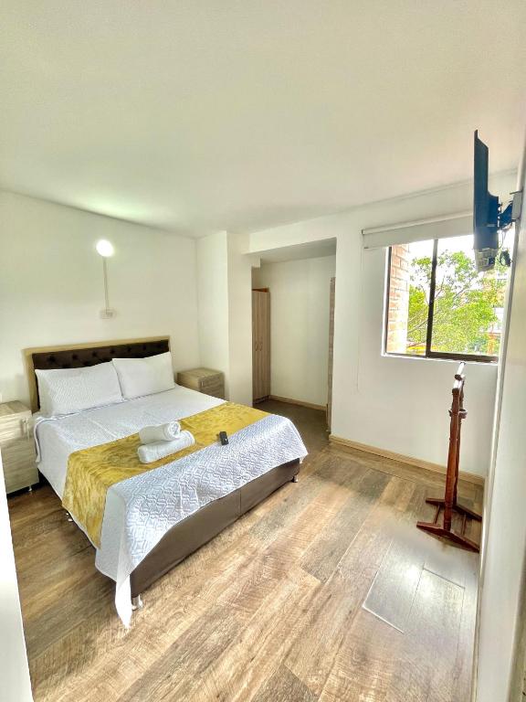 Postel nebo postele na pokoji v ubytování Hotel Torre Primavera