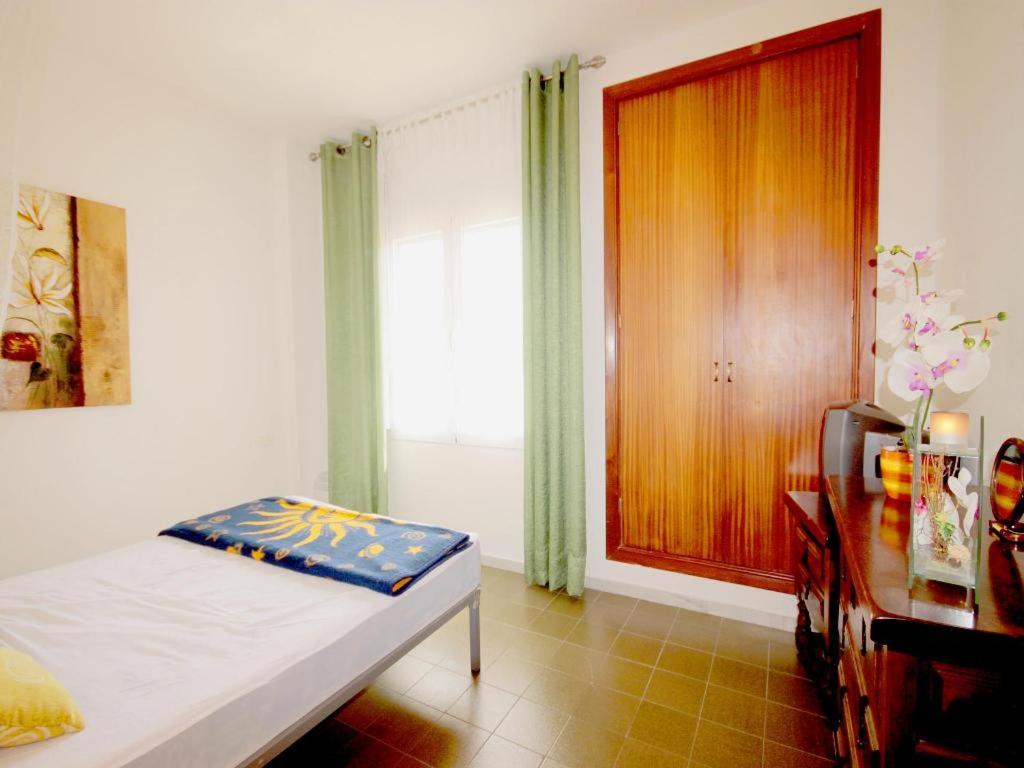 A bed or beds in a room at Apartment Montañar