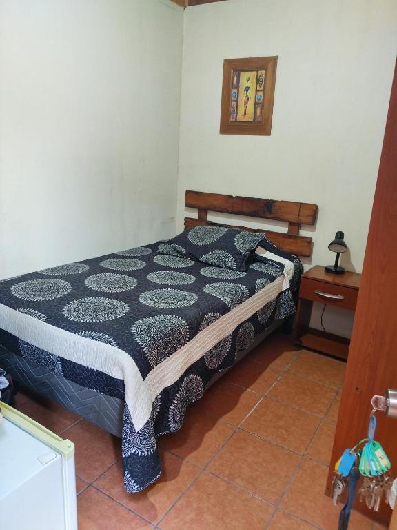 Postel nebo postele na pokoji v ubytování Hostal Cactus Copiapo
