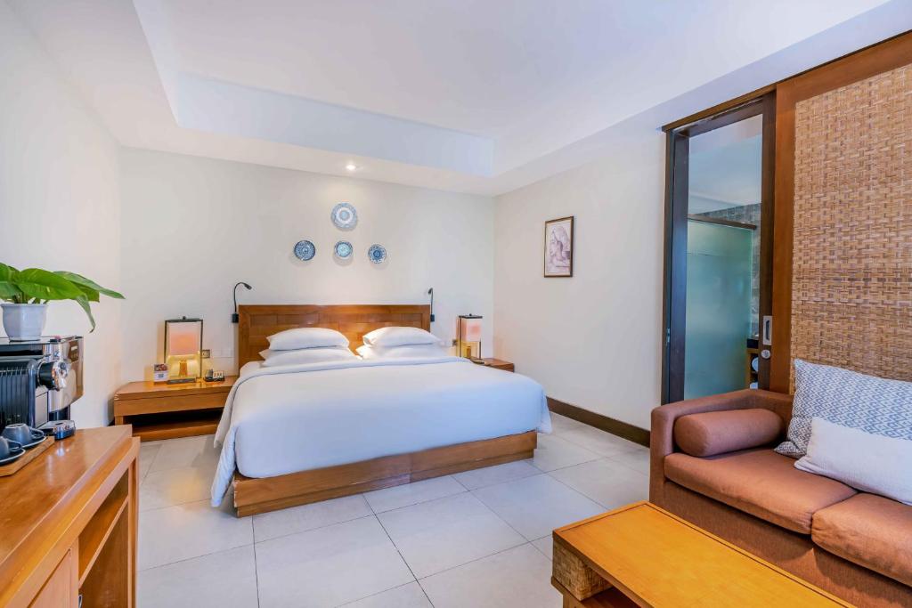 Postel nebo postele na pokoji v ubytování Rama Garden Hotel Bali