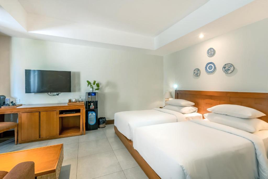 TV a/nebo společenská místnost v ubytování Rama Garden Hotel Bali