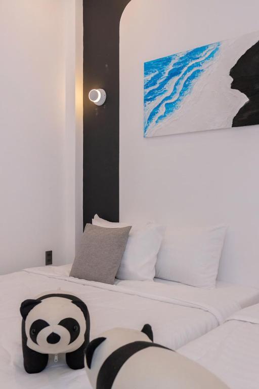 Postel nebo postele na pokoji v ubytování Villa Candle In The Wind - Gần Bãi Sau Vũng Tàu