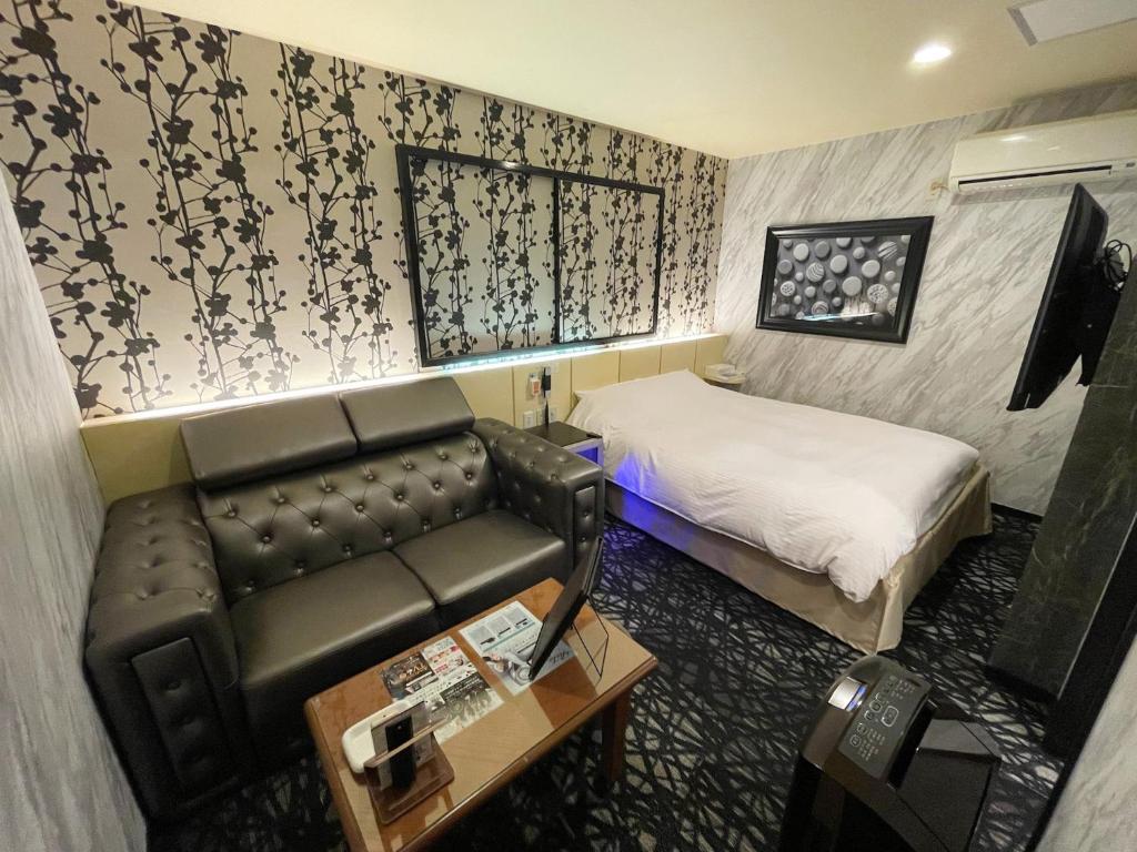 Postel nebo postele na pokoji v ubytování Hotel Vanilla (Adult Only)