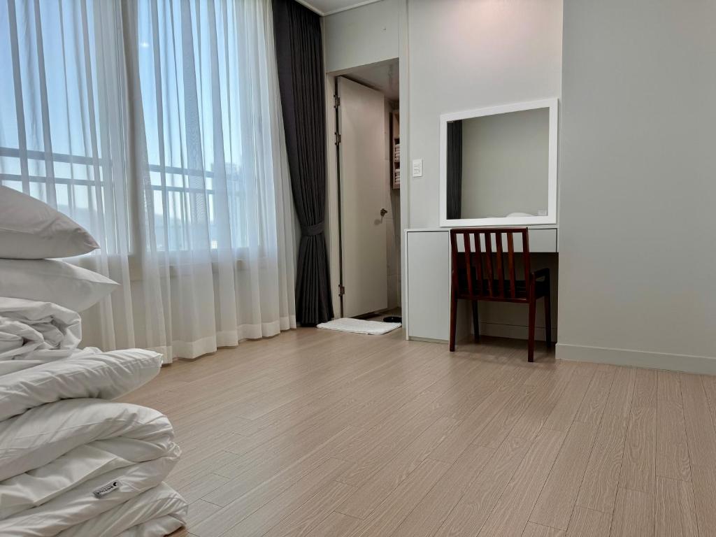 Letto o letti in una camera di Eunhasu D&M Residence