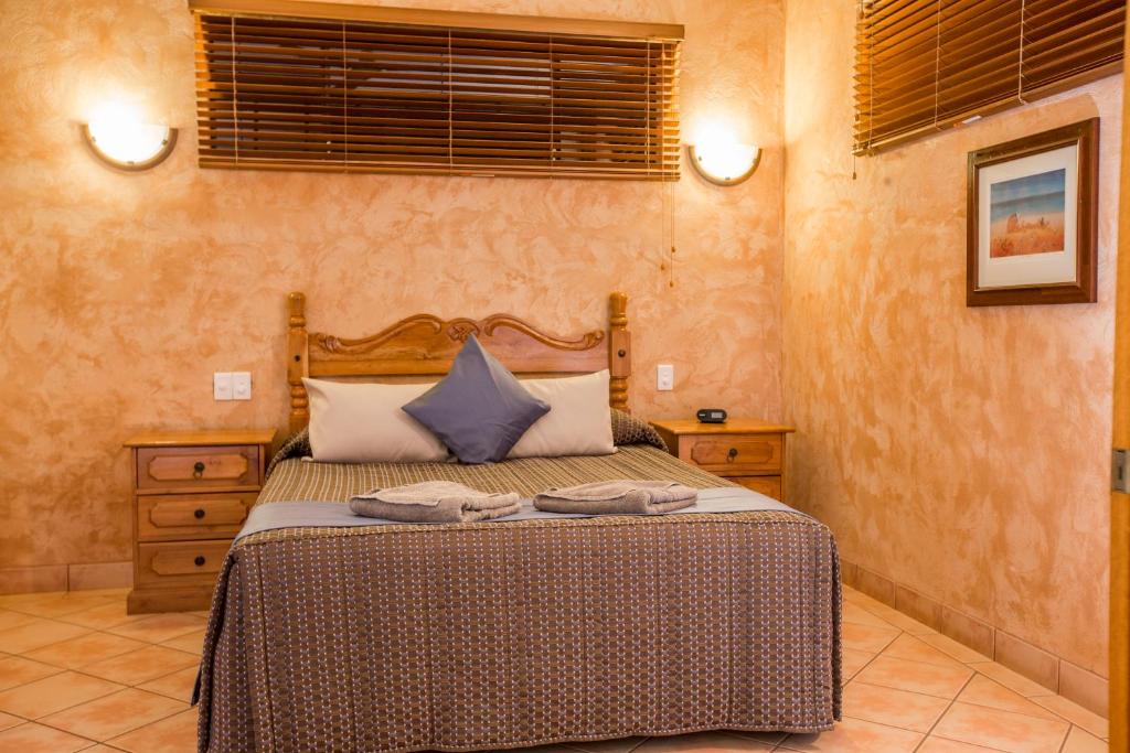 Postel nebo postele na pokoji v ubytování Blue Seas Resort