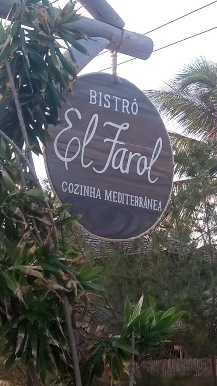 a sign for a bistro gelato cafe at El Farol Bistrô e Pousada in Fortim