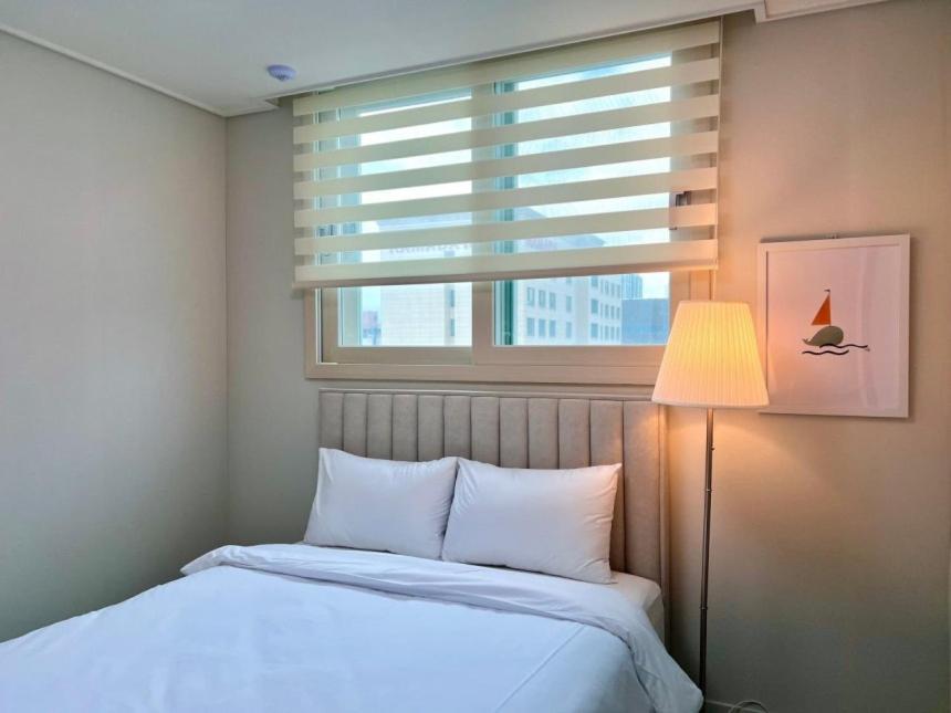 Letto o letti in una camera di Eunhasu D&M Residence