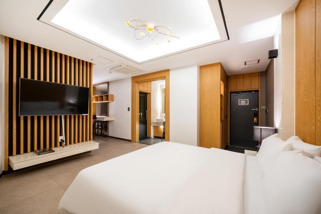 Postel nebo postele na pokoji v ubytování Hotel Artheim