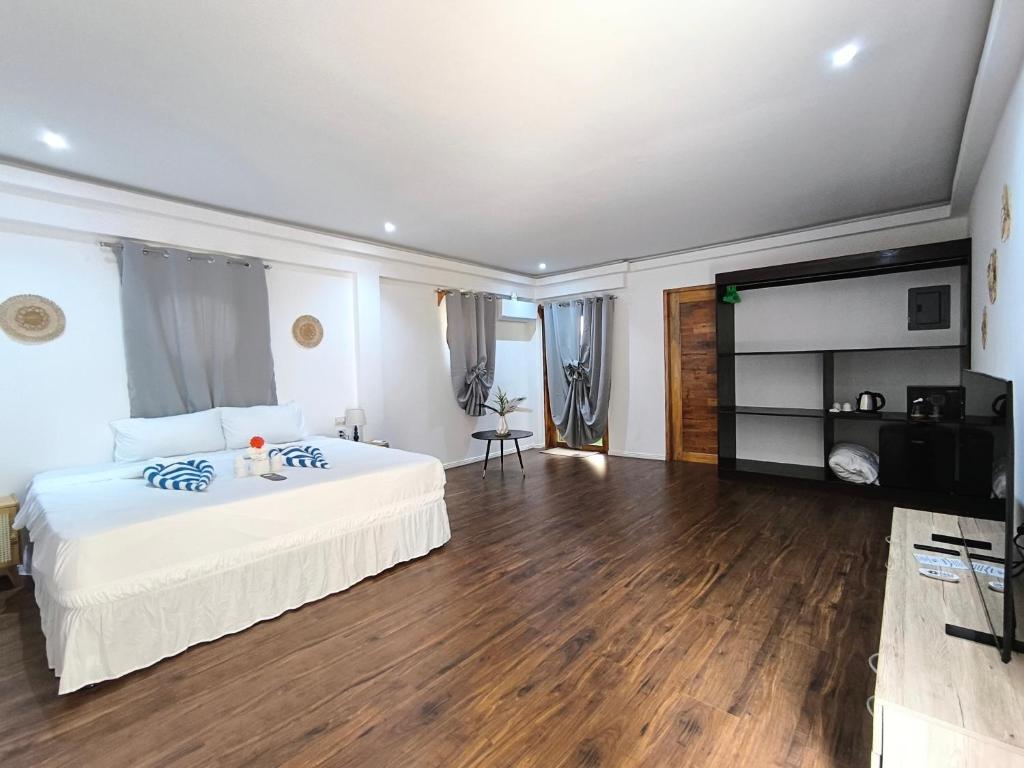 Postel nebo postele na pokoji v ubytování U Story Resort