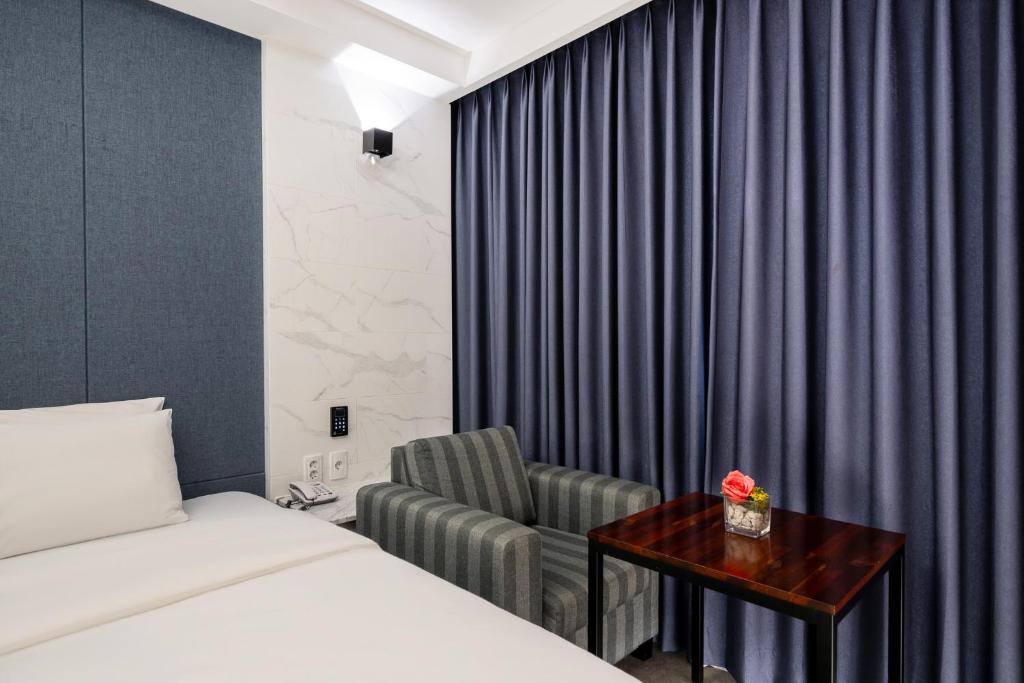 Postel nebo postele na pokoji v ubytování Hotel Artheim