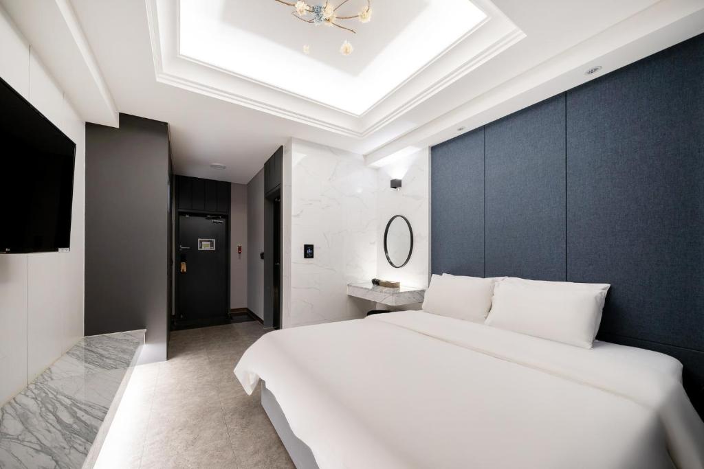 Postel nebo postele na pokoji v ubytování Hotel Artheim