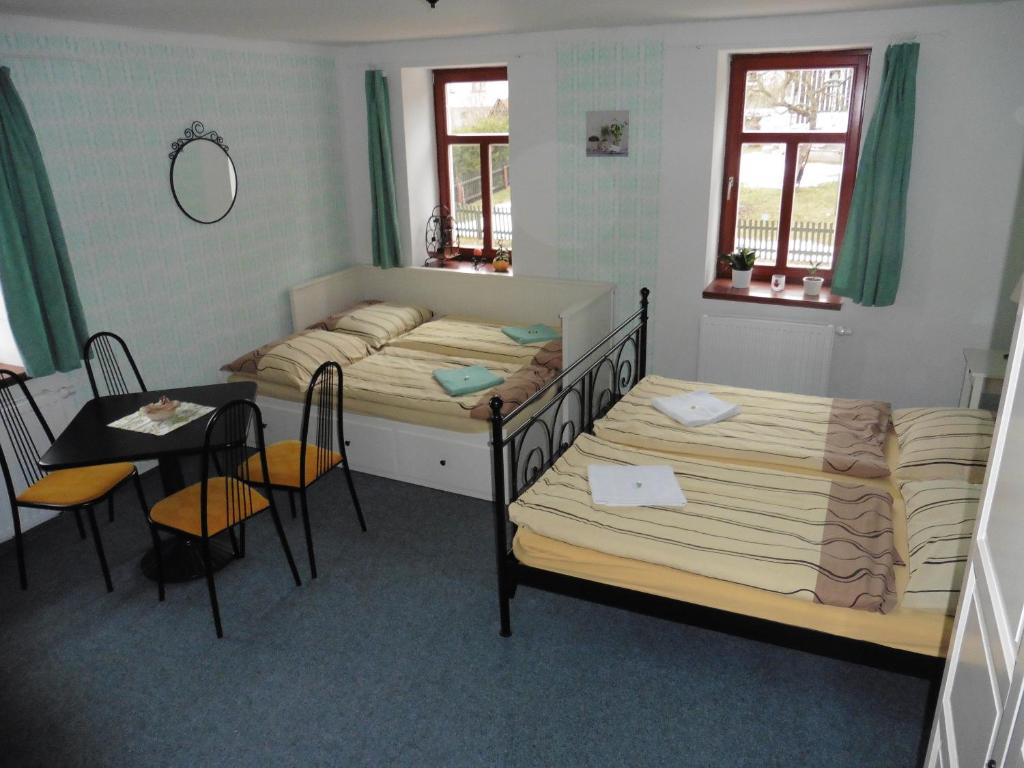 Postel nebo postele na pokoji v ubytování Jako doma