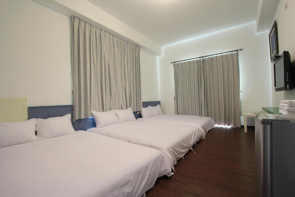 Postel nebo postele na pokoji v ubytování Otousann B&B