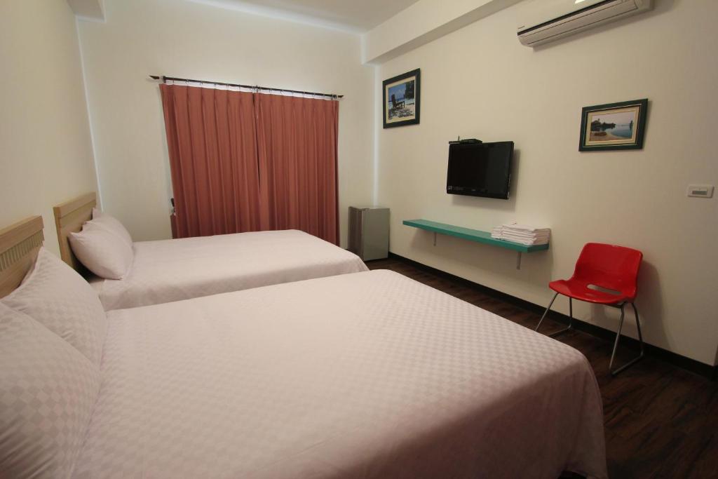 Postel nebo postele na pokoji v ubytování Otousann B&B