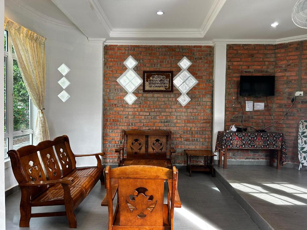 TV a/nebo společenská místnost v ubytování Kundasang Guesthouse