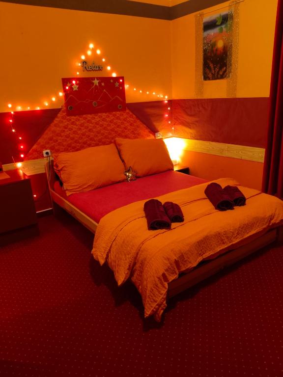 Łóżko lub łóżka w pokoju w obiekcie Pension Relax