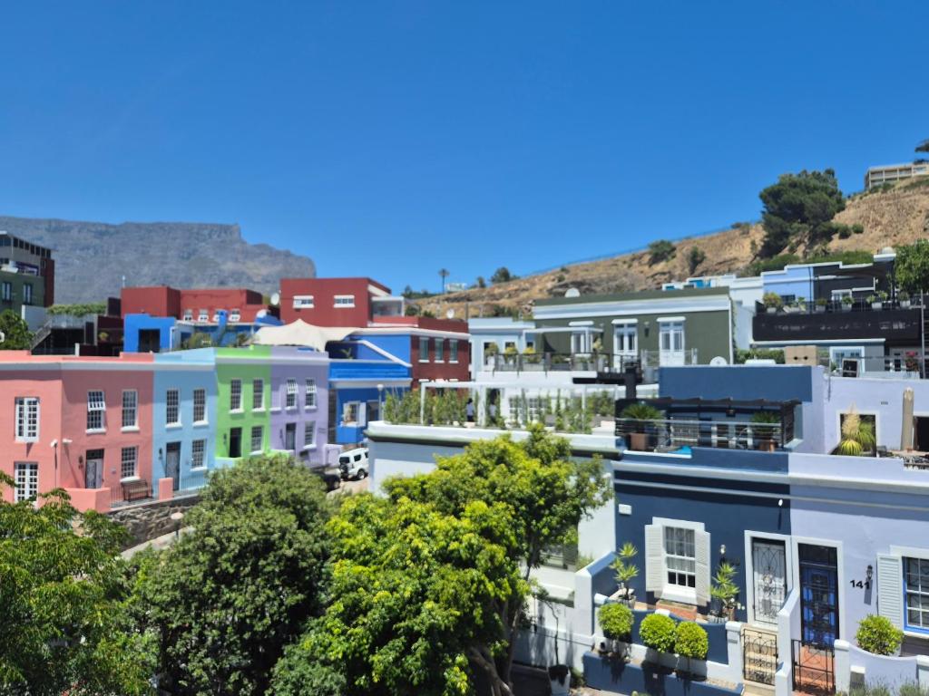 a view of a city with colorful buildings at De Waterkant Cottages in Cape Town
