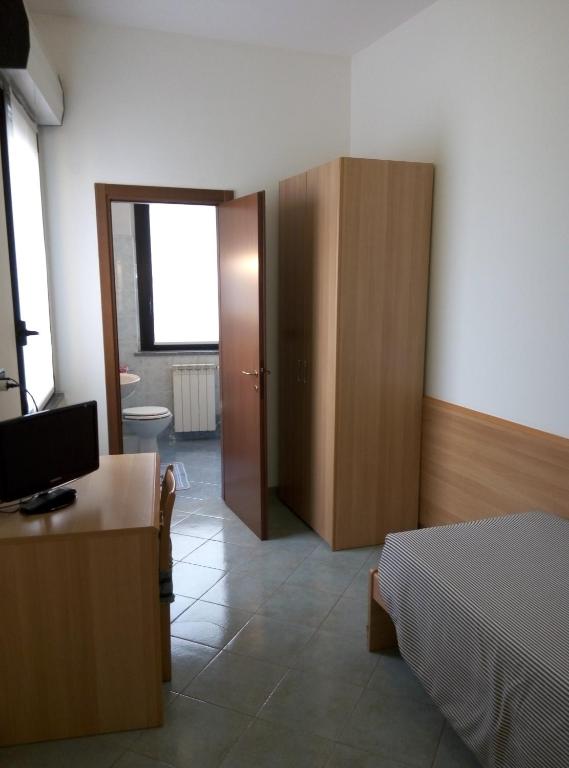 Posteľ alebo postele v izbe v ubytovaní Hotel Cristallo