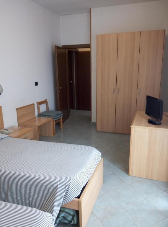 Posteľ alebo postele v izbe v ubytovaní Hotel Cristallo