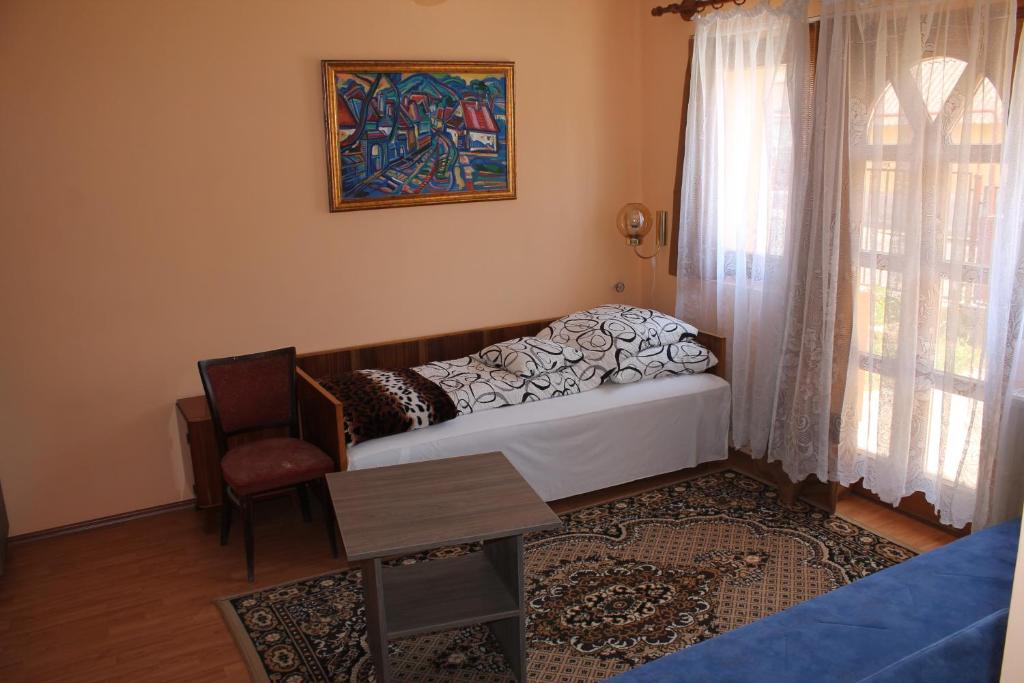 Postel nebo postele na pokoji v ubytování Diófa Vendégház