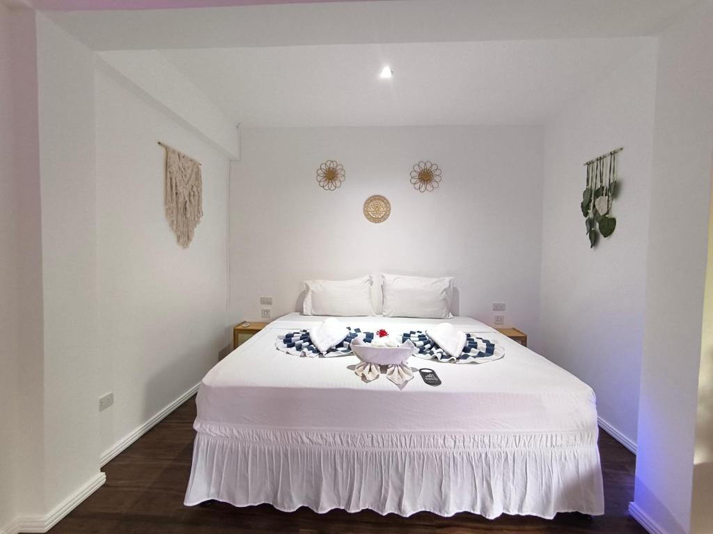 Postel nebo postele na pokoji v ubytování U Story Resort