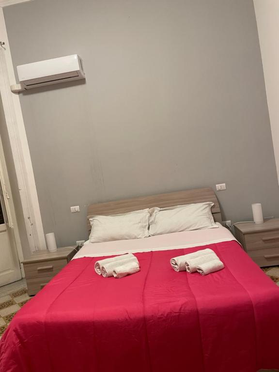 Posteľ alebo postele v izbe v ubytovaní 100 PASSI al Massimo