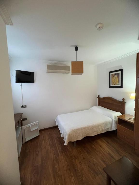 Posteľ alebo postele v izbe v ubytovaní Hotel Restaurante Dama de Baza