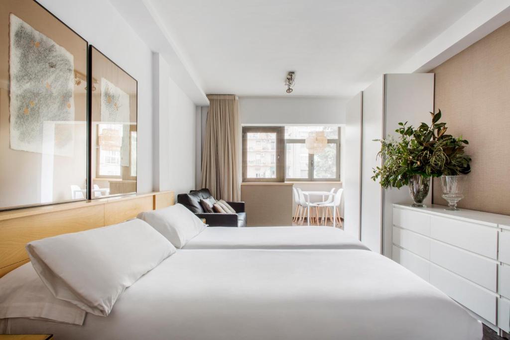 Posteľ alebo postele v izbe v ubytovaní Barcelona Apartment Aramunt