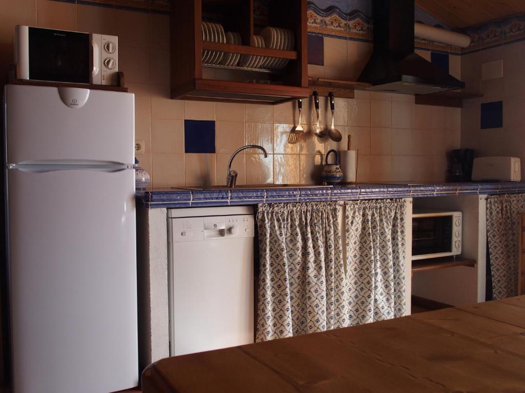 Kuchyň nebo kuchyňský kout v ubytování Casa Lueza