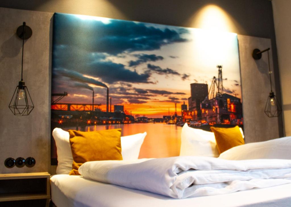 Postel nebo postele na pokoji v ubytování Hotel-Restaurant Steuermann