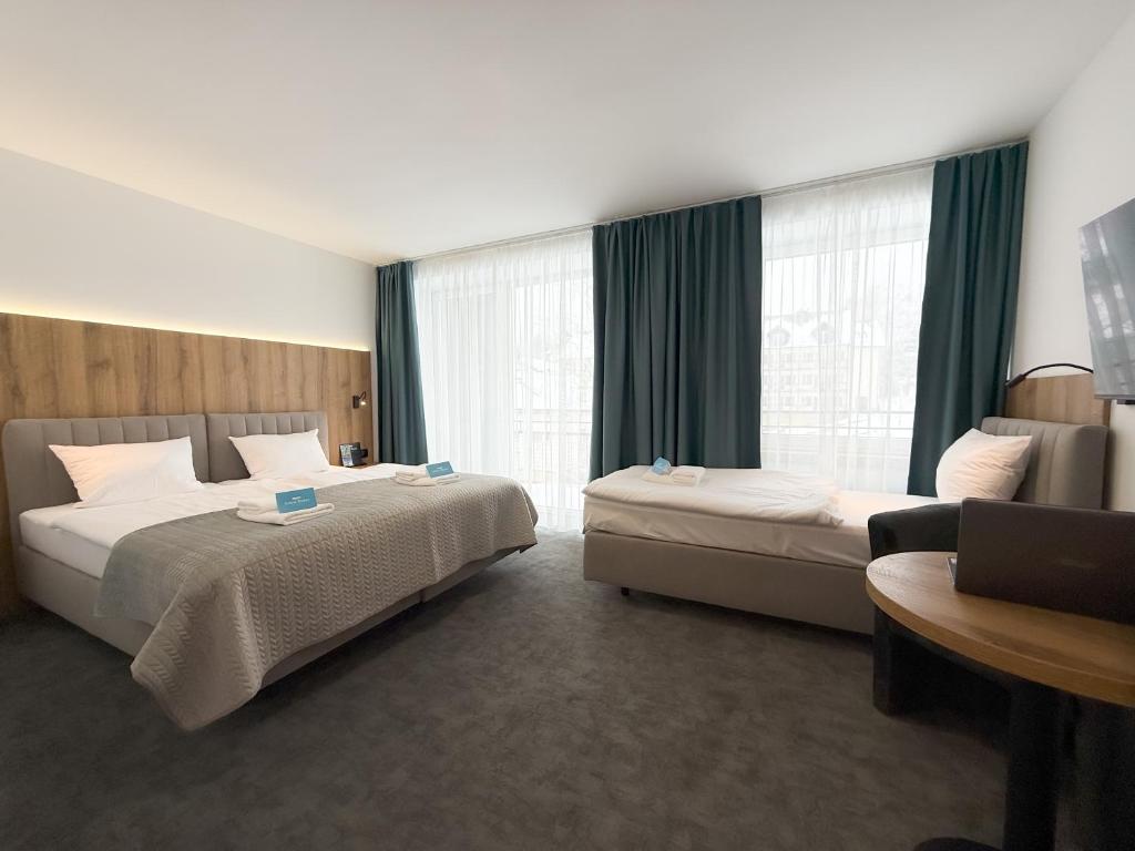 Postel nebo postele na pokoji v ubytování Solina Resort