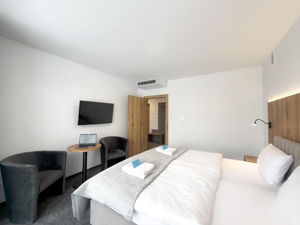 Postel nebo postele na pokoji v ubytování Solina Resort