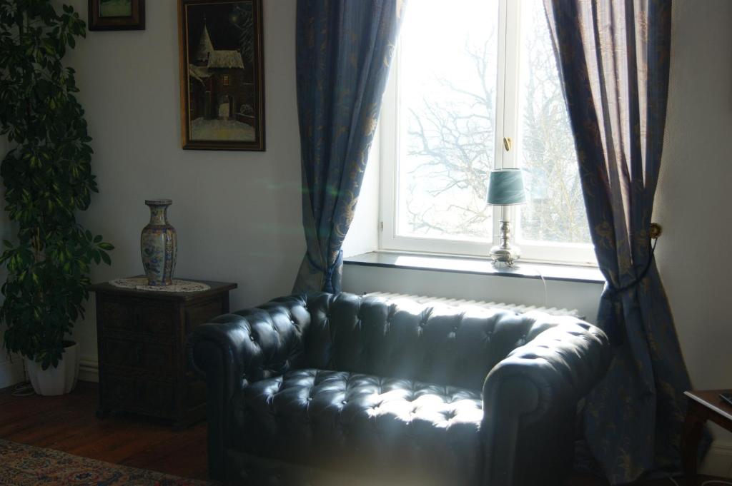 Posezení v ubytování Chateau Neufays