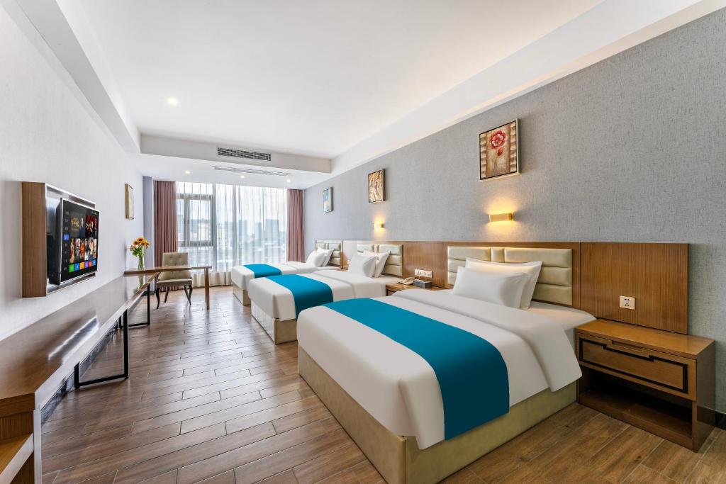 Postel nebo postele na pokoji v ubytování Yunli Boutique Hotel