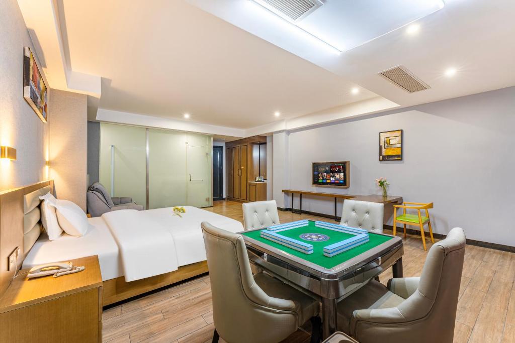 TV a/nebo společenská místnost v ubytování Yunli Boutique Hotel