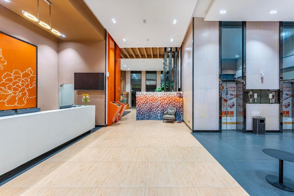 Postel nebo postele na pokoji v ubytování Yunli Boutique Hotel
