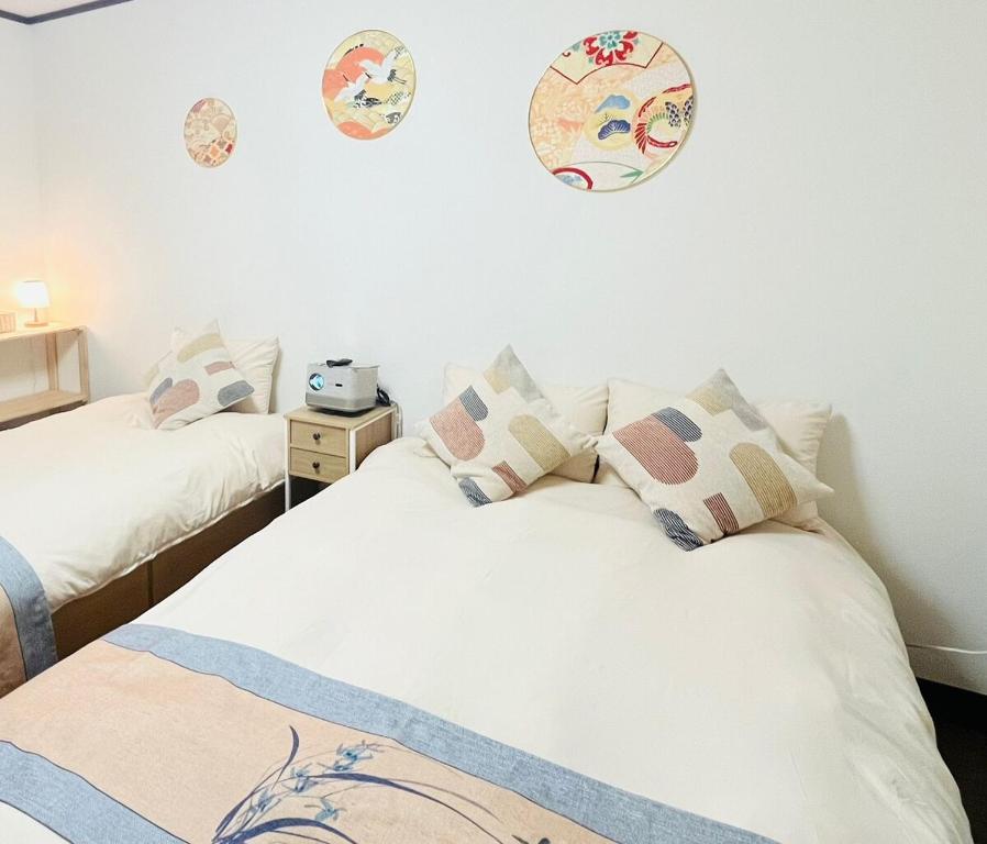 Voodi või voodid majutusasutuse SHINSEKI402 Newオープン割引あり 千鳥駅徒歩8分 ユニバーサル迄近い toas