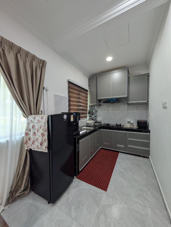 Kuchyň nebo kuchyňský kout v ubytování Flouzan Villa