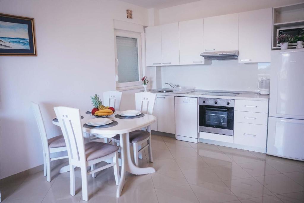 Η κουζίνα ή μικρή κουζίνα στο Gloria