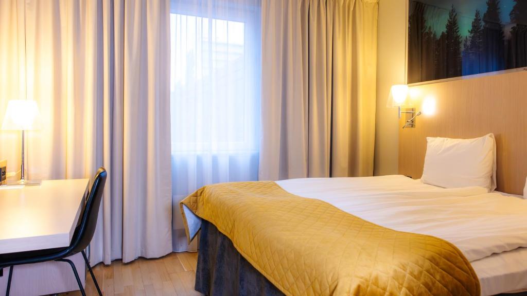 Postel nebo postele na pokoji v ubytování Quality Hotel Sundsvall