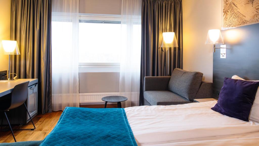 Postel nebo postele na pokoji v ubytování Quality Hotel Sundsvall