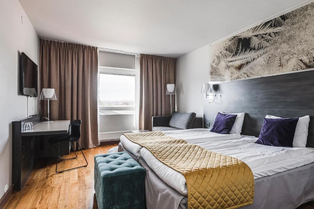 Postel nebo postele na pokoji v ubytování Quality Hotel Sundsvall